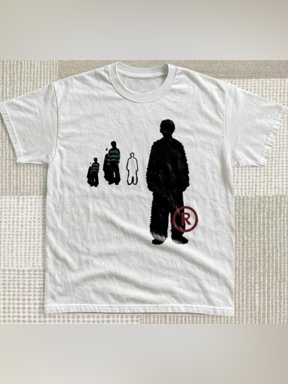 White Tee with Black Silhouette and Green Accent